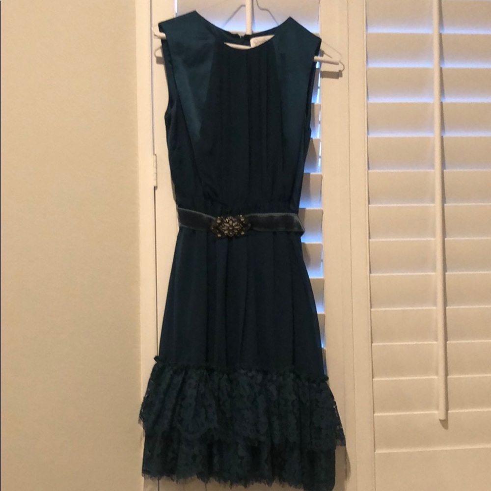 Dark teal dress.